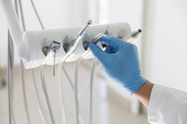 Professional Tooth Extraction technician working in Siler City, NC